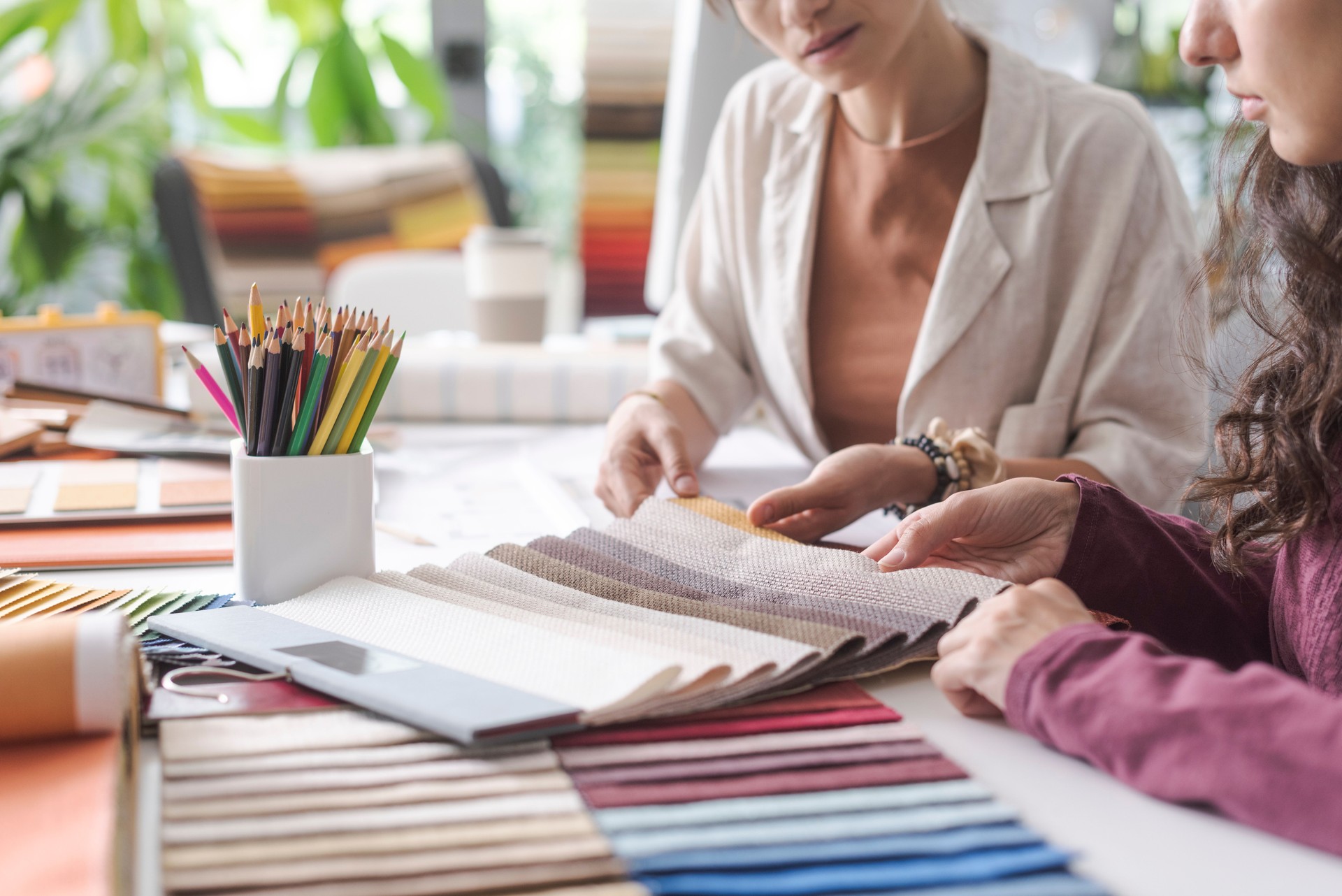 Interior designers checking fabric swatches